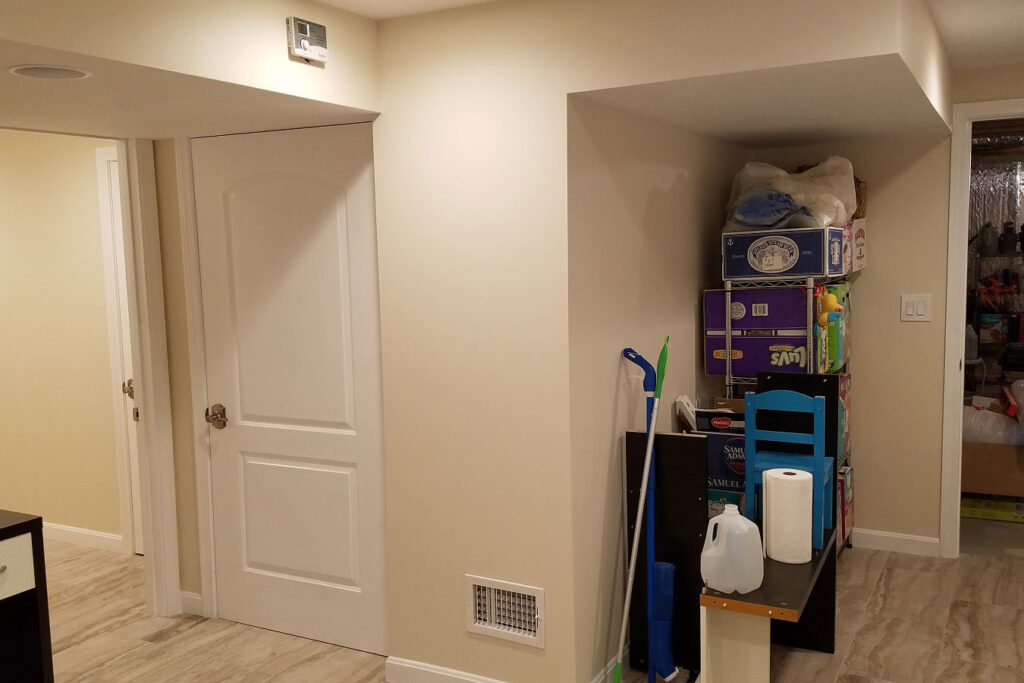 Basement renovation: New tile floor and sheetrock walls and ceilings.