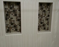 Two niches with mosaic accents.