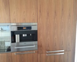 Built in coffee machine and Fridge.