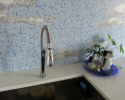 Smart faucet and beautiful mosaic.