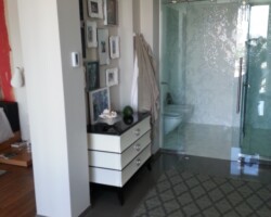 Tile installation in new constructed master bathroom.