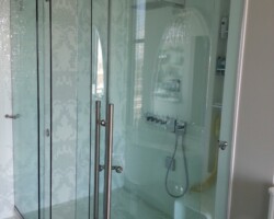 Custom made glass sliding shower doors.