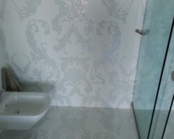 Mosaic transition from wall to floor.