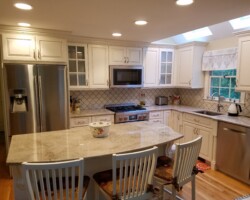 Kitchen cabinets, backsplash and appliances installation.