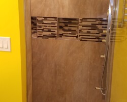 Custom niches with glass mosaic.