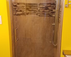 Clear glass shower door.