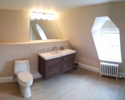 New tile floor and hanging vanity.