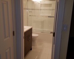 Completely renovated bathroom with tub.