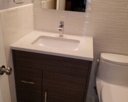 New vanity with quartz top.