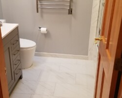 Towel warmer on the wall.