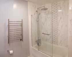 New tub, shower system and shower door.