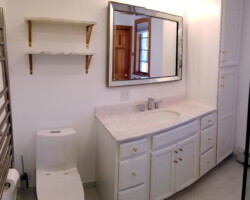 Combination of vanity and tall cabinet.