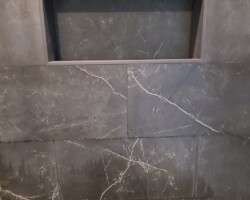 Custom made tiled niche.
