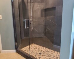 New clear glass shower door.