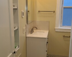 Completely renovated bathroom with heated floor.