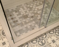Square drain grill with square mosaic.