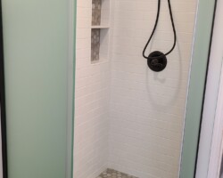 Dark trim and white tiles.