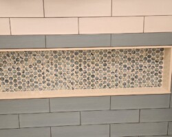 Custom niche with mosaic.