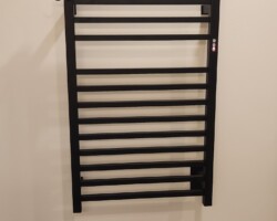 Towel warmer is a nice addition to the bathroom.