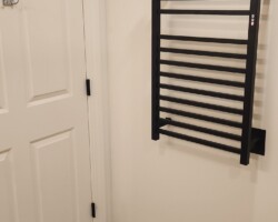 Towel warmer is a nice addition to the bathroom.