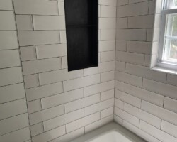 Custom niche with shelves.