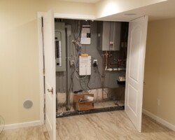 Utility closet with double doors.
