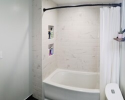 Custom made niches perfectly aligned with tiles.