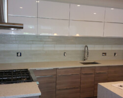 Kitchen Backsplash. Glass tile installation.