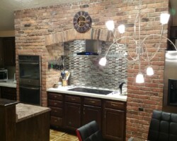 Kitchen backsplash. Tile replacement, new light and range hood.