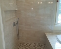 Hexagon mosaic shower floor.