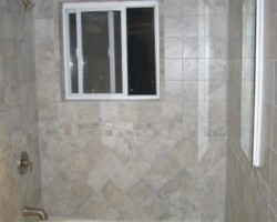 Tile installation up to the ceiling.