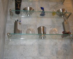 More shelves above the toilet.
