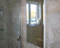 Second recessed medicine cabinet makes more storage room.