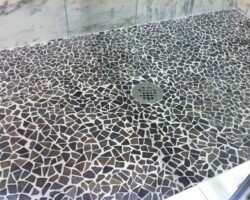 Mosaic shower floor.
