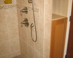 Built in tall cabinet next to the shower room.