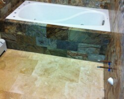 Travertine floor tiles.
