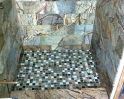 Completely renovated half bathroom with Black Forest marble.